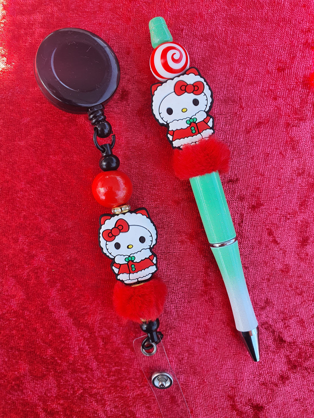 Kitty pen and retractable ID tag holder