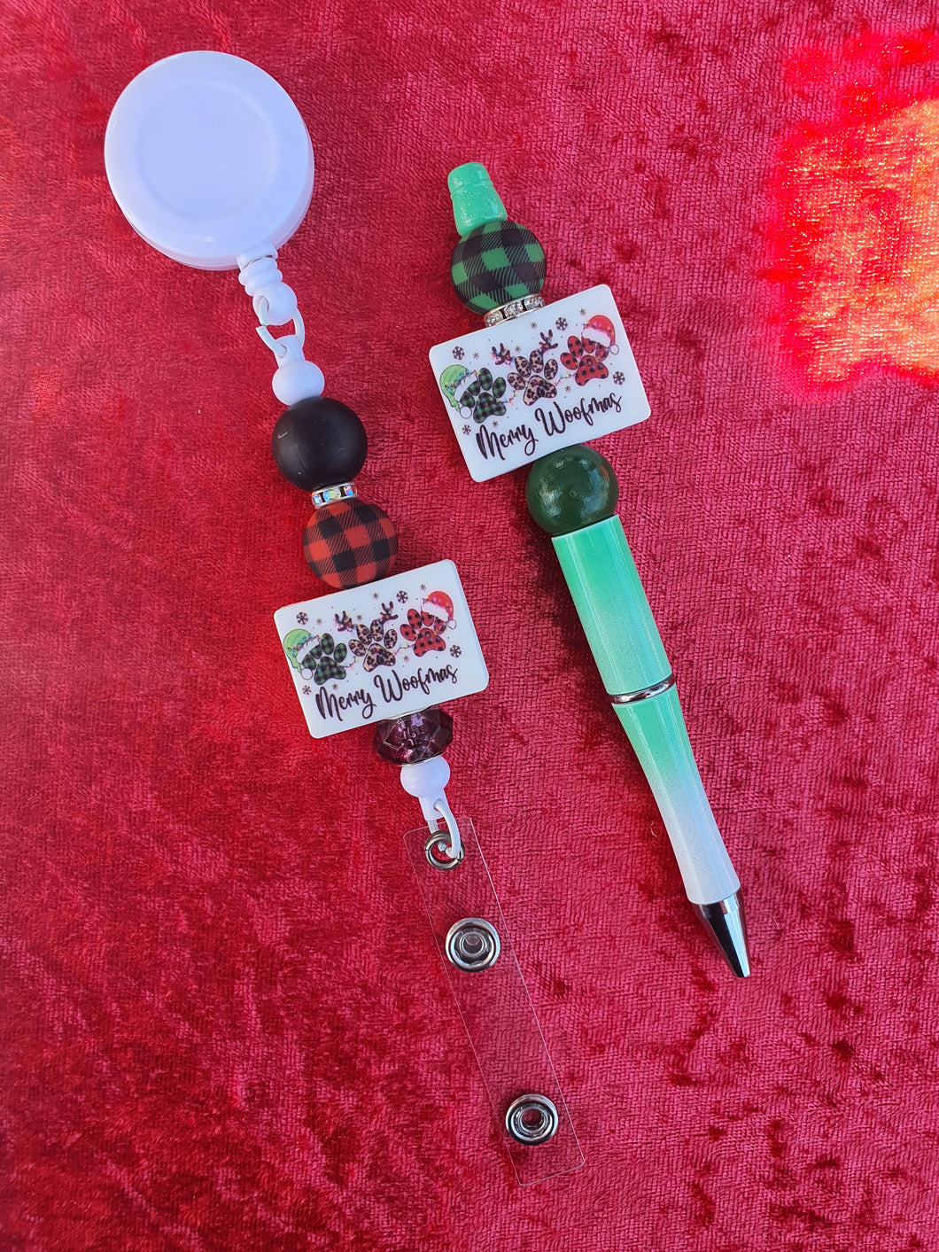 Paw print pen and retractable ID tag holder